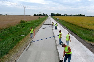 A crew with Beniach Construction Company places a concrete road in Clay County, Illinois. Credit: Beniach Construction