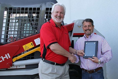 Jimi Martin receives his award.