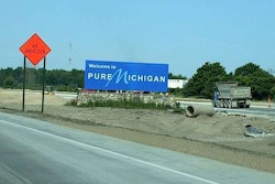 Michigan welcome sign with road work