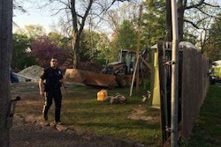 An officer at the scene of the collapse. Credit: Dave Hutchinson/NJ.com