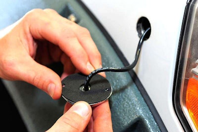 Place foam gasket on lighthead to seal water out of mounting hole.