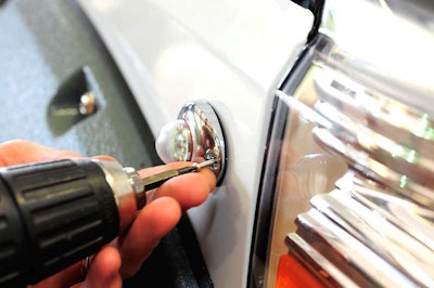 Place Vertex assembly into position adn use self-tapping screws supplied with light to attach to the fender.