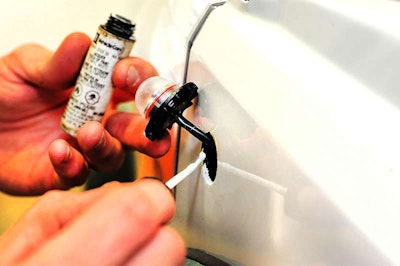 Use touch-up paint to seal bare metal edge of body to prevent rust.