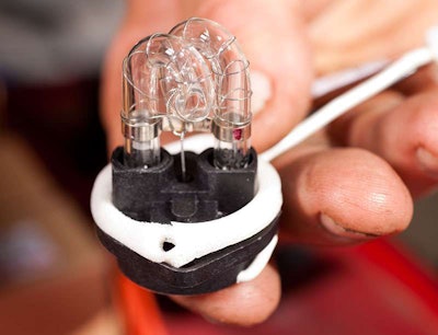 Positon the gasket over the flashtube/strobe unit.