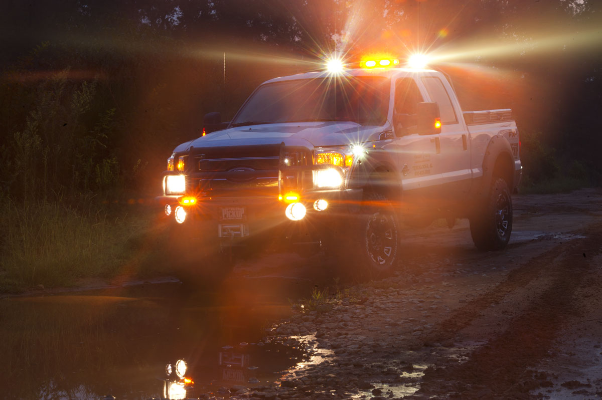Fender-mounted Whelen dome-shaped LED strobes greatly enhance a pickup's side visibility in bad weather.
