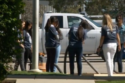 A group of girls receive instruction during the summit.