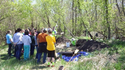 IDOT’s Brennan Dolan talks to Belmond-Klemme school students about archeology and how it relates to highway projects.