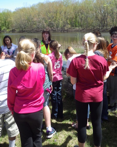 Lindsay Edgar, IDOT Wetland Biologist talks to students about wetland preservation efforts.