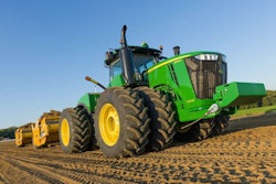 John Deere’s 9620R wheeled tractor scraper system.