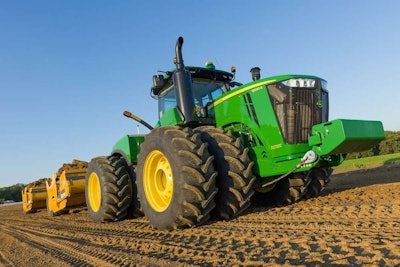 John Deere’s 9620R wheeled tractor scraper system.