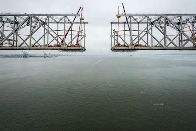 The suspended span of the historic Old Bay Bridge is cut at its center.