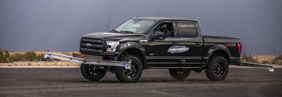 2015 F150, with 6″ Pro Comp lift, outfitted with special outriggers.