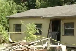 The collapsed home is seen in a still from Fox 29 news footage.