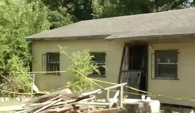 The collapsed home is seen in a still from Fox 29 news footage.