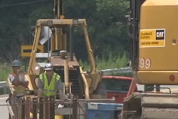 Workers are seen at the site of an embankment and trench collapse near Millville in WBRE news footage.