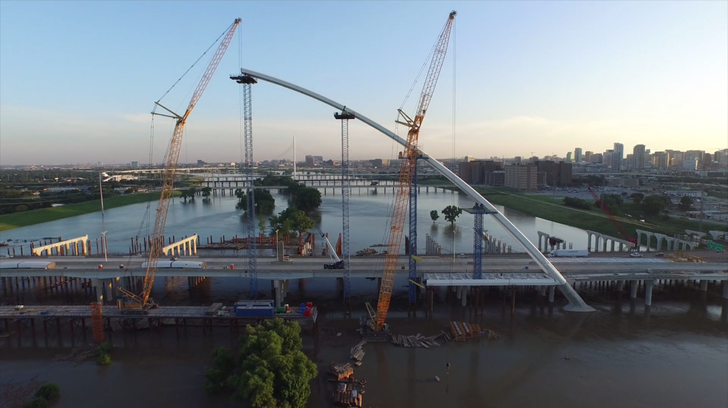 A screenshot of the drone footage. over the Margaret McDermott Bridge construction.
