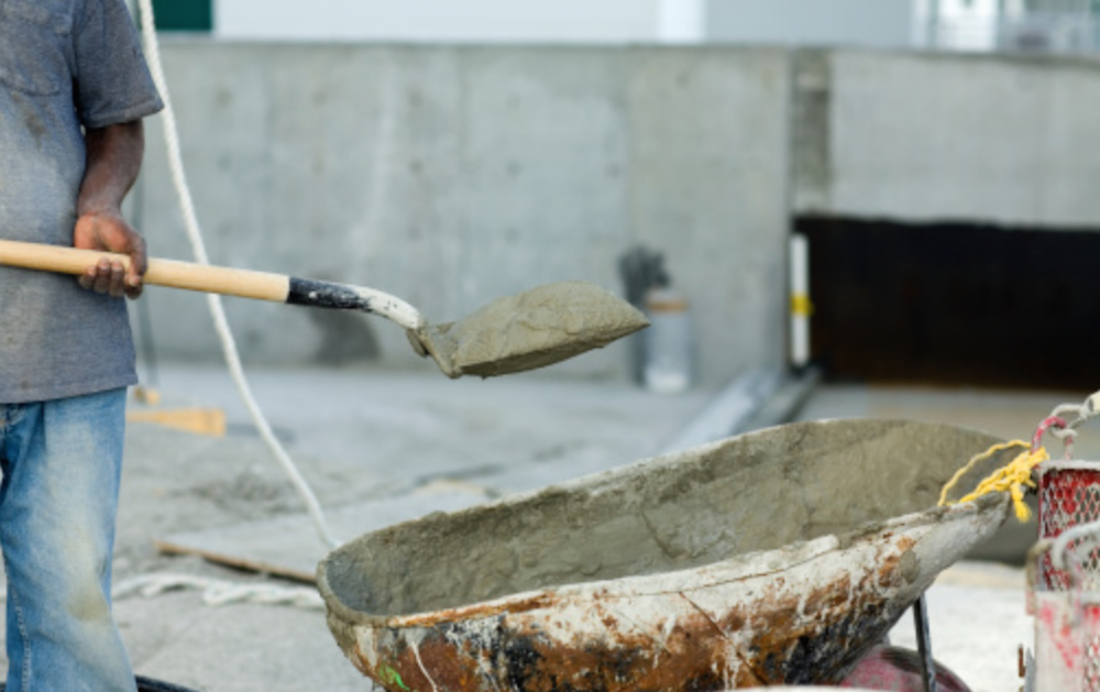 construction worker holding shovel