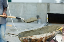 construction worker holding shovel
