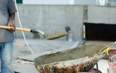 construction worker holding shovel