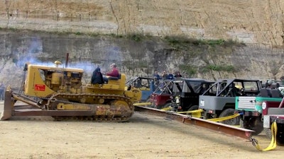 Cat D8 Land Cruiser tug of war