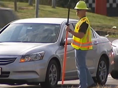 Screen shot of the WSB-TV segment on officers dressed as construction workers to catch distracted drivers.