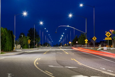 Nighttime view of a section of Bombing Range Road, West Richland, Washington, with new LED luminaires