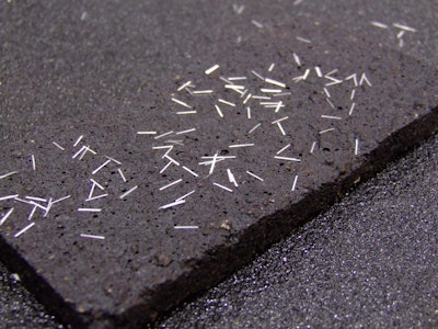 Slurry-FIL fibers on top of a hardened asphalt mix for illustration