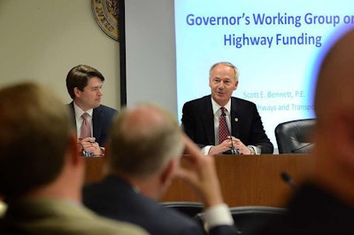 Gov. Hutchinson gives opening remarks at the preliminary meeting for the Working Group on Highway Funding, with Chairman Duncan Baird on June 24, 2015. The Governor encouraged the group to be creative and forward-thinking in their approach.
