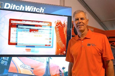 Dennis Wierzbicki, Ditch Witch president, in front of an HDD Advisor display, the company’s web-based tool being showcased at ICUEE.