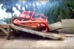 Dozer rolls off platform