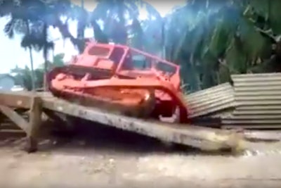 Dozer rolls off platform