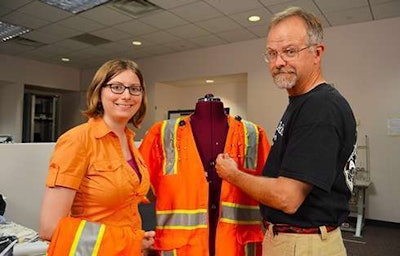 Hines and Martin with the InZoneAlert. Small sensors in the vest communicate with in-vehicle technology to warn construction workers of impending collisions.