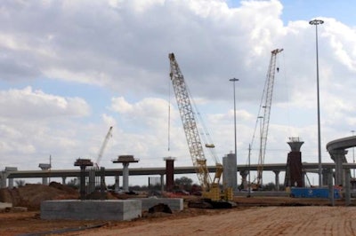 Some of the cranes used by Zachry-Odebrecht during bridge work on segment F-1 of the SH Grand Parkway Project in Houston. Photo Credit: grandparkway99.com