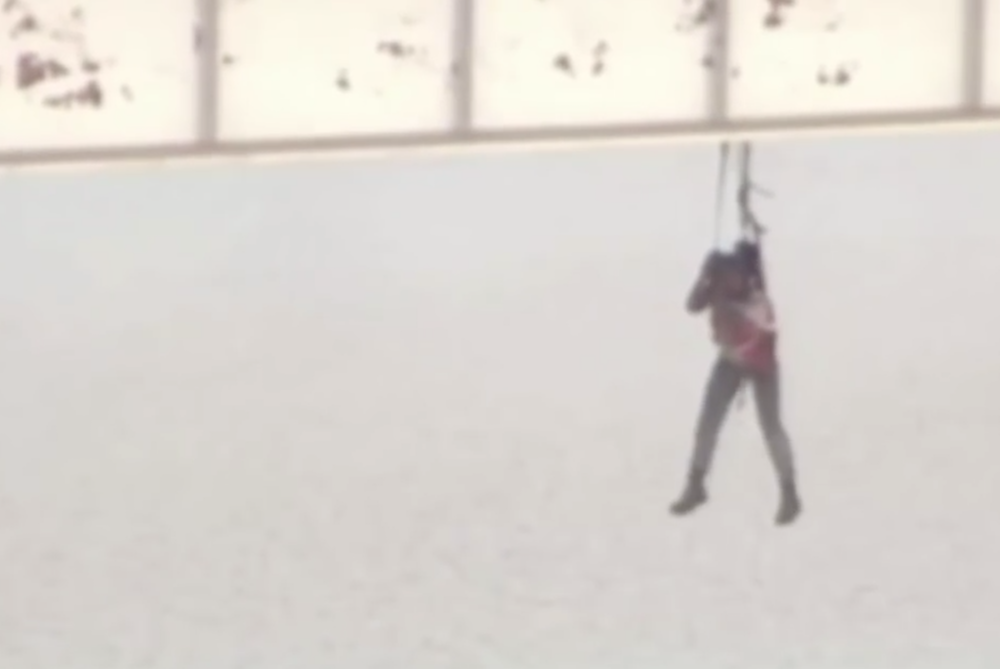 Worker dangling from Texas bridge