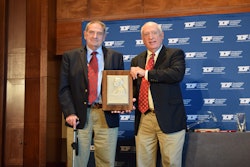 Charles Potts is given the Bartlett Award for his contributions to highway progress.