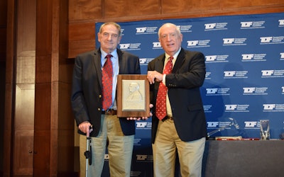 Charles Potts is given the Bartlett Award for his contributions to highway progress.