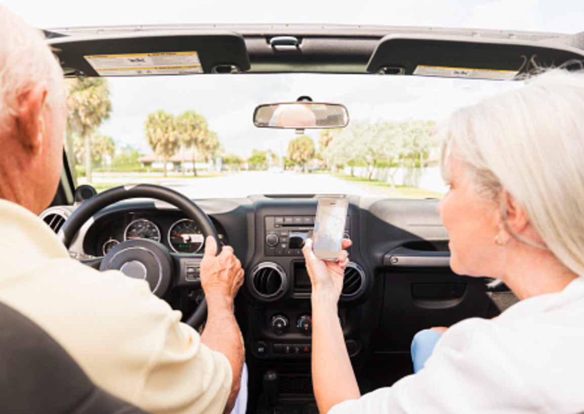 senior citizen driving stock