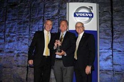 M&K Truck Centers owner Ron Meyering (center) receives the 2015 Volvo Trucks North American Dealer of the Year award from Göran Nyberg, president, Volvo Trucks North America (left) and Terry Billings, Volvo Trucks vice president – business development (right).