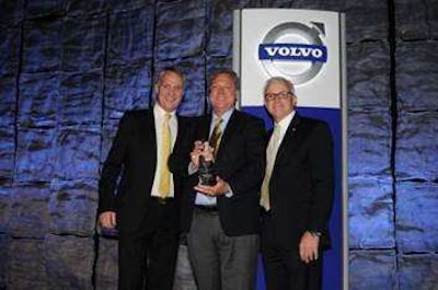 M&K Truck Centers owner Ron Meyering (center) receives the 2015 Volvo Trucks North American Dealer of the Year award from Göran Nyberg, president, Volvo Trucks North America (left) and Terry Billings, Volvo Trucks vice president – business development (right).