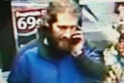 A gas station security camera shows the thief.