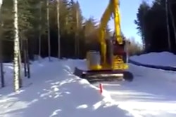 Excavator sledding