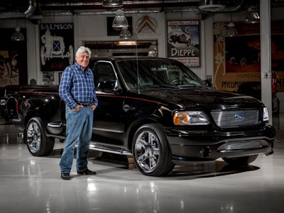 Jay Leno is teaming up with Ford to auction his single production 2000 Ford F-150 Harley-Davidson edition.