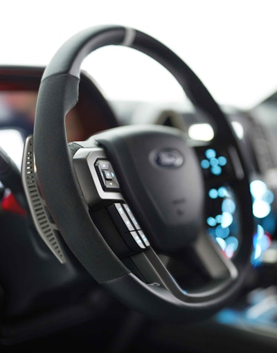 Ford’s 2017 F-150 Raptor features paddle wheel shifting. It’s a first in the high performance truck. The silver shifting lever is on the left side of the steering wheel.