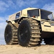 The Russian-built Sherp rolls over rugged terrain and lakes.