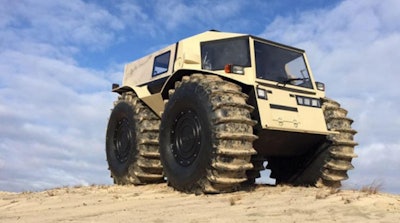 The Russian-built Sherp rolls over rugged terrain and lakes.