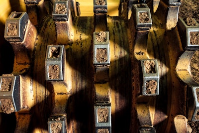 The 815K’s wheel design allows for equal compaction in both forward and reverse. Photo by Wayne Grayson