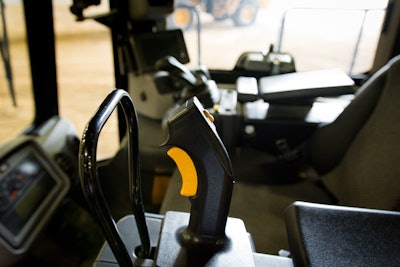 The 815K features Cat STIC steering with quick transmission control via a trigger.