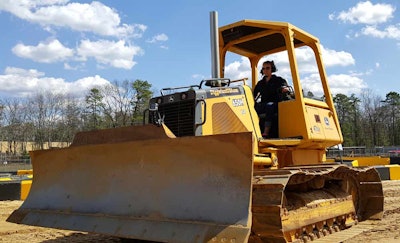 A John Deere 750 in operation at Diggerland XL.
