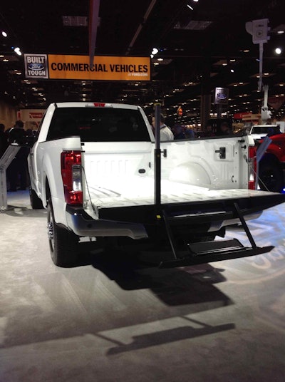 The integrated step tucked into the tailgate of 2017 F-Series Super Duty pickups includes a hand post.