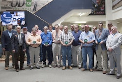 Oklahoma DOT field divisions and crews were recognized for good safety records at a recent meeting of the Oklahoma Transportation Commission. They wore orange ribbons in honor of the 59 ODOT workers who have died in the line of duty and to remind everyone to practice safe driving in highway work zones. Back row, from left: Division 7 Engineer Jay Earp, Gray County Maintenance Superintendent Rick Davis, Data Collection Branch Manager Aaron Fridrich, Division 4 Construction Engineer Joe Echelle, Oklahoma City Residency Transportation Manager Andy Wilson, Division 3 Bridge Crew Superintendent Dustin Grand, Division 3 Engineer Kevin Bloss, Division 1 Engineer Darren Saliba and Checotah Interstate Maintenance Superintendent Sam Duvall. Front row, from left: Division 5 Engineer Brent Almquist, Blaine County Maintenance Superintendent Mark Wray, Division 6 Shop Superintendent Bruce Appleton, Division 6 Engineer Ron McDaniel, Ottawa County Maintenance Superintendent Dustin Marang, Division 8 Engineer Randle White, Division 2 Division Wide Maintenance Superintendent Roddy Mills, Division 2 Engineer Anthony Echelle and ODOT Safety Branch Manager Mike Bracken.